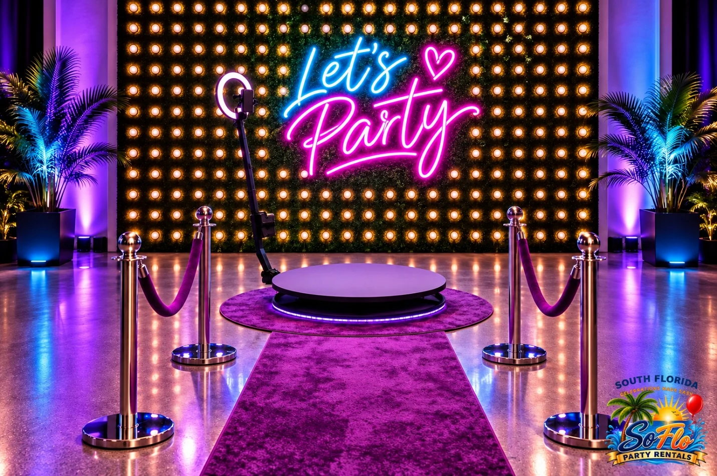 360° photo booth platform with a purple carpet and illuminated Let’s Party backdrop